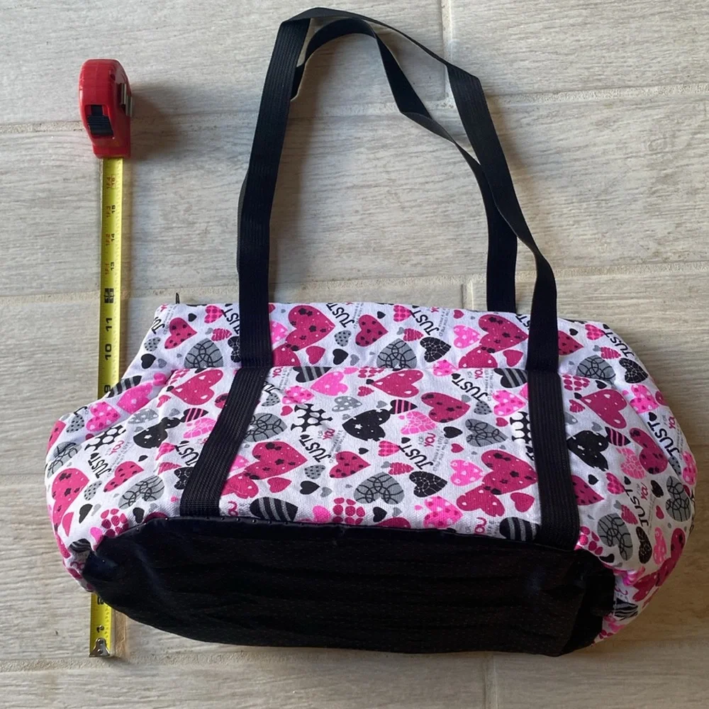 Pet Carrier.10.5”tall x 20”wide x 9”Deep. Long straps. Removable bottom. Zipper
